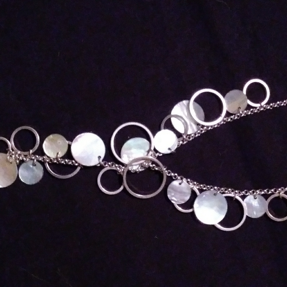 SALE! Vintage Avon shell & silver circle charms sp sorry it’s sideways!
